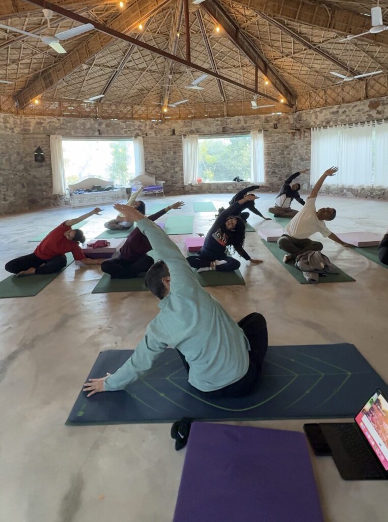 Yoga teacher in Juhu Mumbai conducting relaxing meditation session